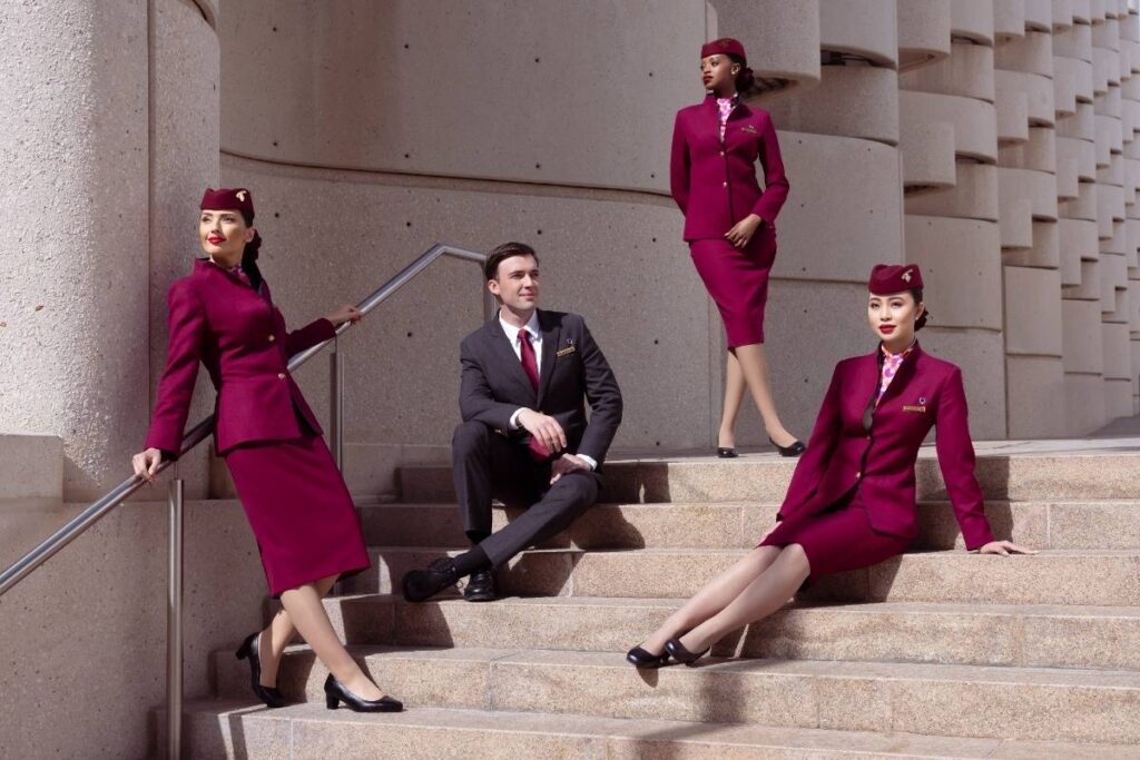 Qatar Airways Qsuites Business Class cabin interior Doha LHR route 2026